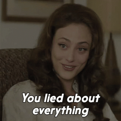 A Woman Sitting In A Chair With The Words " You Lied About Everything " On The Bottom GIF