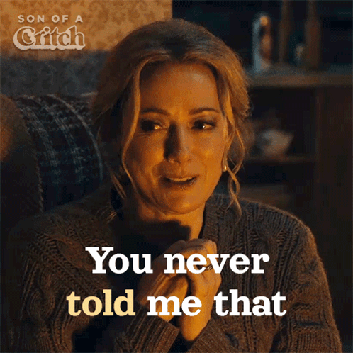 A Woman Sitting In A Chair With The Words You Never Told Me That Above Her GIF