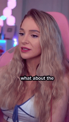 A Woman Sitting In A Pink Chair With The Words Slurp Slurp On Her Face GIF
