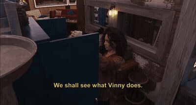 A Woman Sitting In A Room With The Words We Shall See What Vinny Does GIF