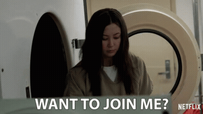 A Woman Sitting In A Washing Machine With The Words " Want To Join Me " On The Bottom GIF