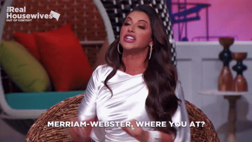 A Woman Sitting In A Wicker Chair With The Words Merriam-Webster Where You At GIF