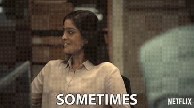 A Woman Sitting In Front Of A Computer With The Words Sometimes Written On Her Shirt GIF