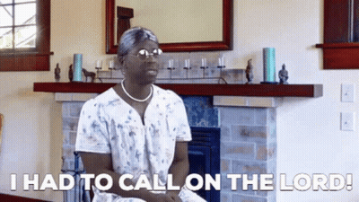 A Woman Sitting In Front Of A Fireplace With The Words " I Had To Call On The Lord " GIF