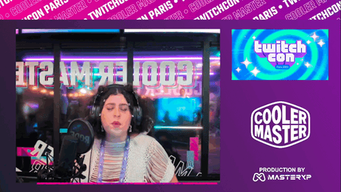 A Woman Sitting In Front Of A Microphone With A Cooler Master Logo On The Bottom GIF