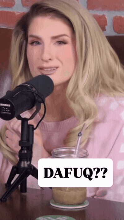 A Woman Sitting In Front Of A Microphone With A Sign That Says Dafuq On It GIF