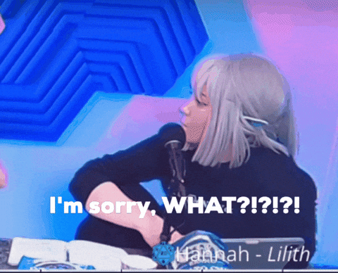 A Woman Sitting In Front Of A Microphone With The Words " I 'M Sorry What ? " GIF