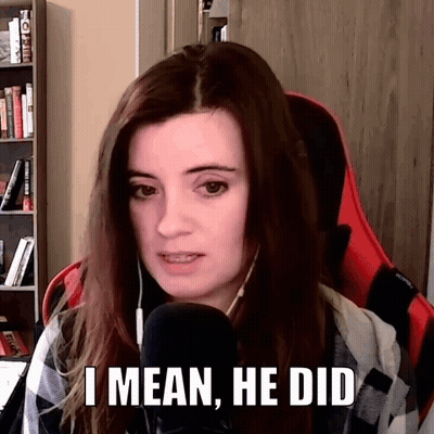 A Woman Sitting In Front Of A Microphone With The Words " I Mean He Did " On Her Face GIF