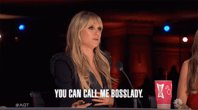 A Woman Sitting In Front Of A Microphone With The Words You Can Call Me Bosslady GIF
