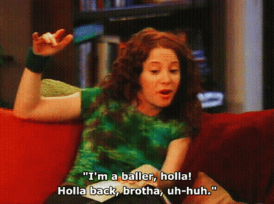 A Woman Sitting On A Couch Says " I 'M A Baller, Holla " GIF