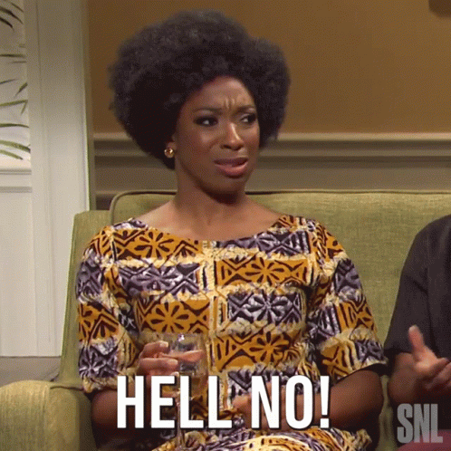 A Woman Sitting On A Couch With A Glass Of Wine And The Words Hell No GIF