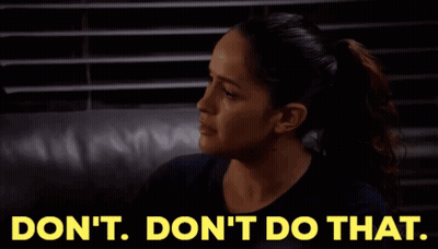 A Woman Sitting On A Couch With The Words " Do N't Do That " Written On The Bottom GIF