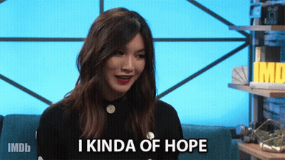 a woman sitting on a couch with the words i kinda of hope on her face