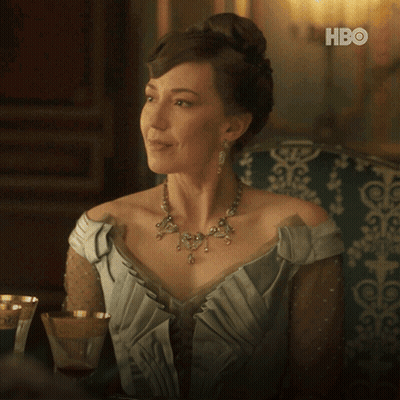 A Woman Sitting On A Couch With The Words I 'Ll Leave You To Your Point Above Her GIF