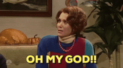 A Woman Sitting On A Couch With The Words Oh My God GIF