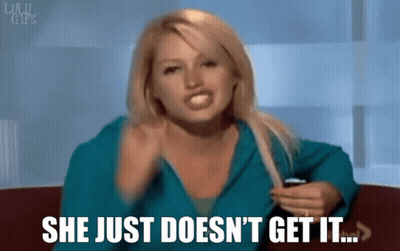 A Woman Sitting On A Couch With The Words She Just Does N't Get It GIF