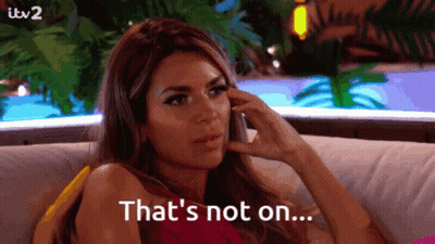 A Woman Sitting On A Couch With The Words That 'S Not On Written Below Her GIF