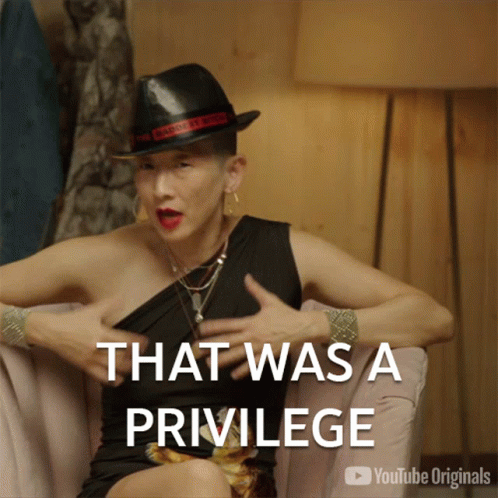 A Woman Sitting On A Couch With The Words That Was A Privilege GIF