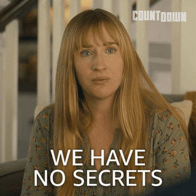 A Woman Sitting On A Couch With The Words We Have No Secrets Behind Her GIF