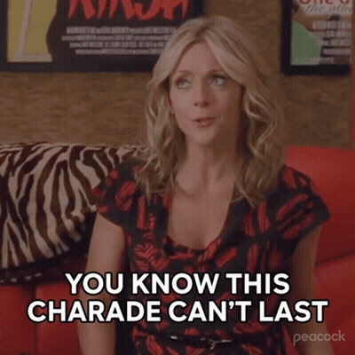 A Woman Sitting On A Red Couch Says You Know This Charade Can 'T Last GIF