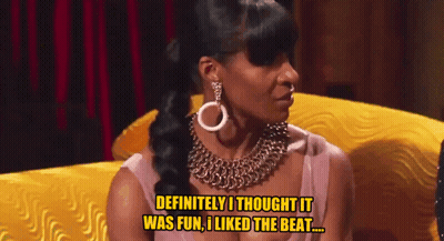 A Woman Sitting On A Yellow Couch Says " Definitely I Thought It Was Fun I Liked The Beat " GIF