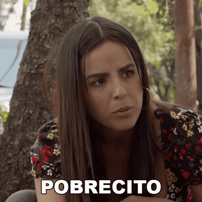 A Woman Sitting Under A Tree With The Word Pobrecito Written On Her Chest GIF