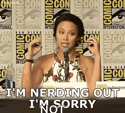A Woman Speaking Into A Microphone With The Words I 'M Nerding Out I 'M Sorry Behind Her GIF