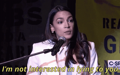 A Woman Speaking Into A Microphone With The Words " I 'M Not Interested In Lying To You " Next To Her GIF