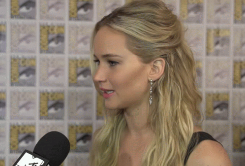 A Woman Speaking Into A Mtv Microphone GIF