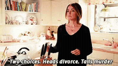 A Woman Standing In A Kitchen With The Words Two Choices Heads Divorce Tails Murder GIF