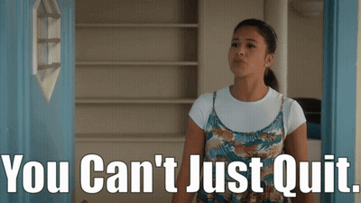 A Woman Standing In Front Of A Blue Door With The Words You Can 'T Just Quit GIF