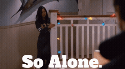 A Woman Standing In Front Of A Railing With The Words So Alone GIF