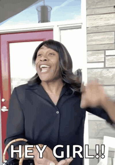 A Woman Standing In Front Of A Red Door Says " Hey Girl " GIF
