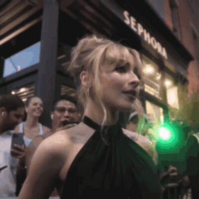 A Woman Standing In Front Of A Sephora Store GIF