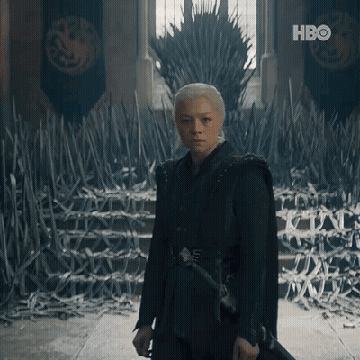 a woman standing in front of a throne with hbo written on the bottom right