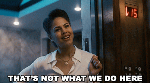 A Woman Standing In Front Of An Elevator With The Words That 'S Not What We Do Here GIF