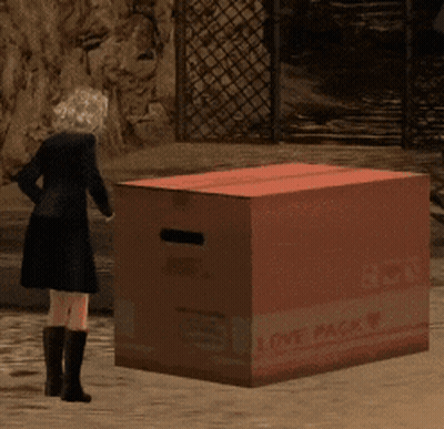 A Woman Standing Next To A Cardboard Box That Says Love Pack On It GIF