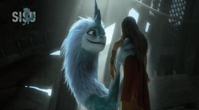 A Woman Standing Next To A Cartoon Dragon With Sisu Written On The Bottom GIF