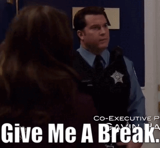 A Woman Standing Next To A Police Officer With The Words Give Me A Break Below Her . GIF
