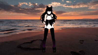 A Woman Standing On A Beach With A Heart In The Sand GIF