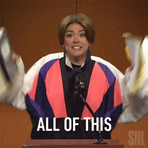 A Woman Stands At A Podium With Her Arms Outstretched And The Words All Of This Above Her GIF