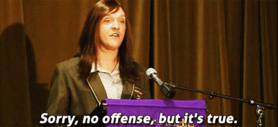 A Woman Stands At A Podium With The Words Sorry No Offense But It 'S True GIF