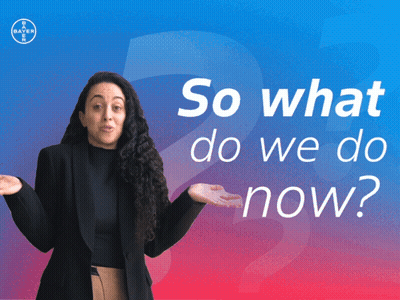 A Woman Stands In Front Of A Blue And Pink Background With The Words So What Do We Do Now GIF