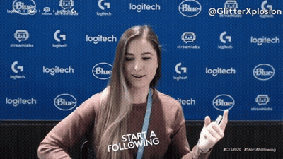 A Woman Stands In Front Of A Blue Background With Logitech And Blue Logos GIF