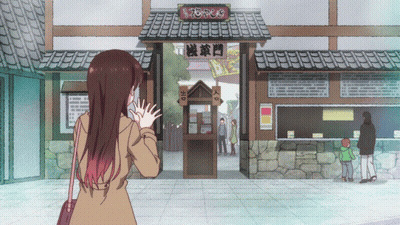 A Woman Stands In Front Of A Building With A Sign That Says " Entrance " GIF