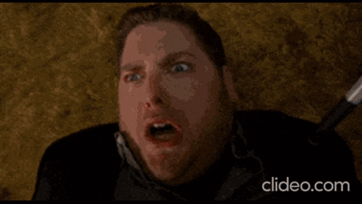 A Woman Stands In Front Of A Crowd At A Party With The Website Clideo.com Visible In The Corner GIF