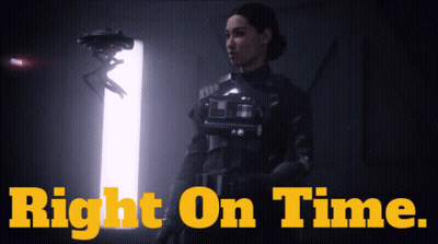 A Woman Stands In Front Of A Door With The Words Right On Time Written On It GIF