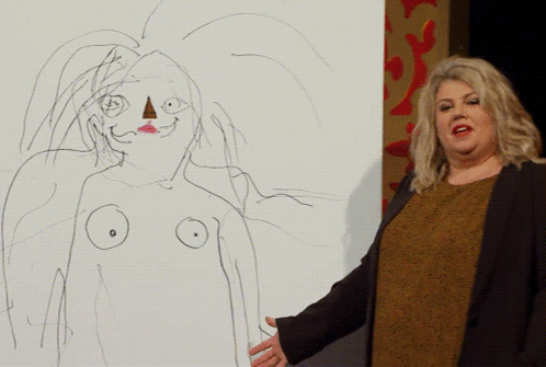 A Woman Stands In Front Of A Drawing Of A Woman GIF