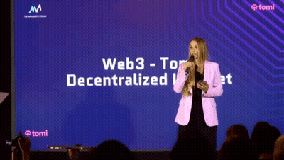 A Woman Stands In Front Of A Large Screen That Says Web3 Tor Decentralized GIF