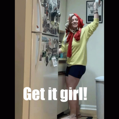 A Woman Stands In Front Of A Refrigerator With The Words Get It Girl Written On It GIF